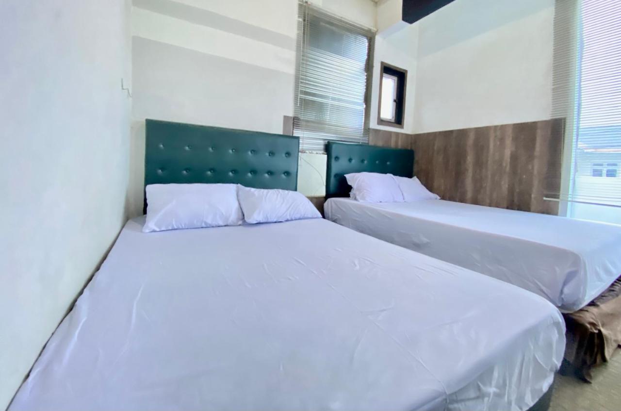 Homestay Batu Kelir Syariah Dieng Mitra Reddoorz Diyeng Exterior foto