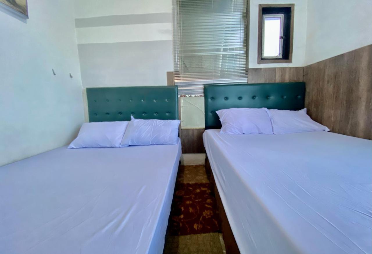 Homestay Batu Kelir Syariah Dieng Mitra Reddoorz Diyeng Exterior foto